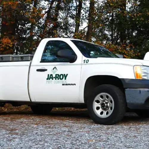 A Ja-Roy service truck before a pest control inspection