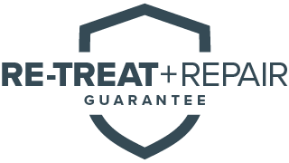 Retreat and repair termite guarantee badge.
