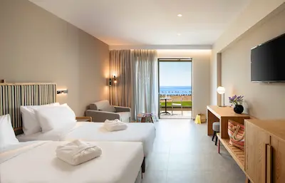 Nice hotel room with two queen beds and a view of the ocean