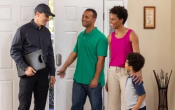 Ja-Roy Pest Technician greeting family after entering their residential home for a pest inspection.